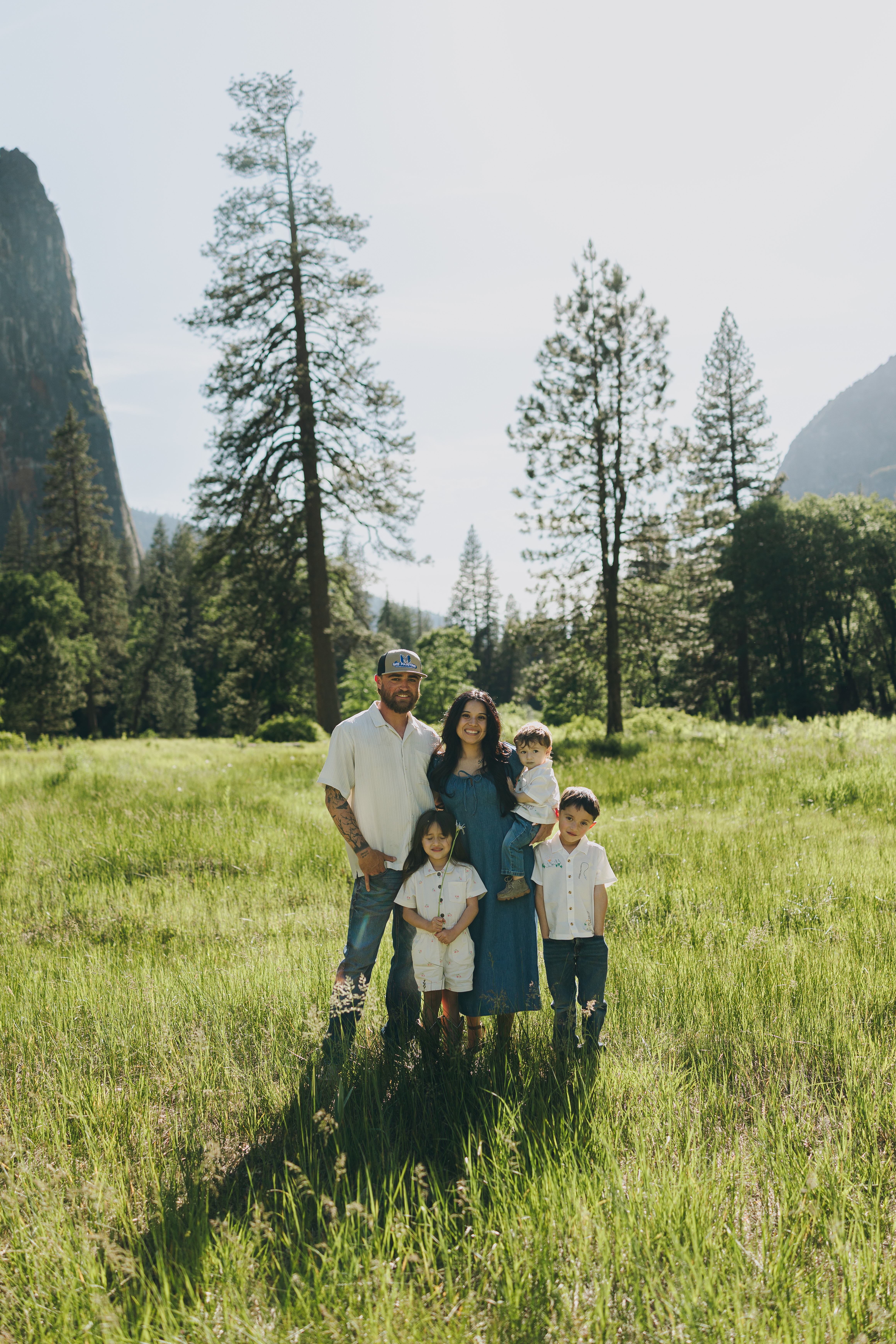 Matt, Leslie, and family standing together